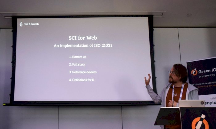 Figure 6: Oliver Winks presenting the 'SCI for Web' model that Root & Branch have developed.