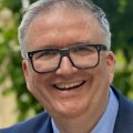 speaker Steve Chinnery